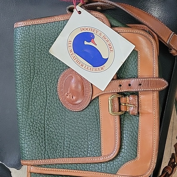 Dooney & Bourke Handbags - Vintage Dooney & Bourke Rare AWL Brand new Authentic satchel